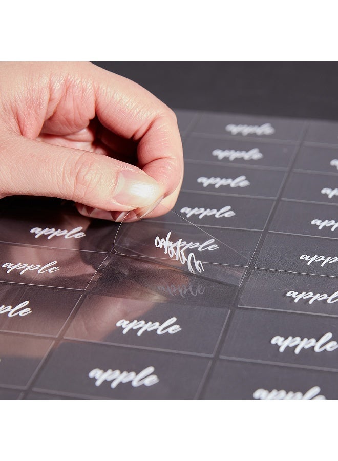 Restaurantware Label Tek 1.9 x 1 Inch Apple Juice Bottle Labels, 100 Water-Resistant Labels For Bottles - Self-Adhesive, Clear With White Font, Plastic Bottle Stickers, For Drink Pouches,