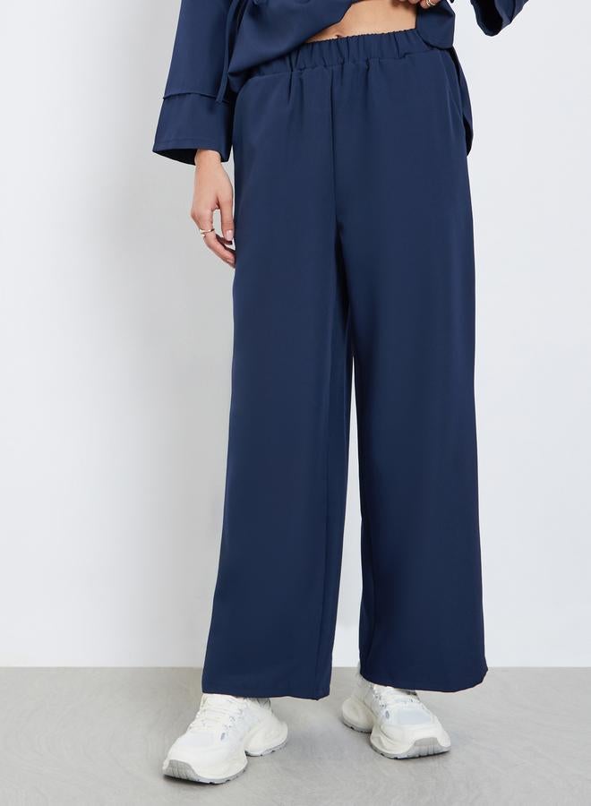 ستايلي طقم منسق من بنطال وبلوزة مزينة بأربطة - Image 4