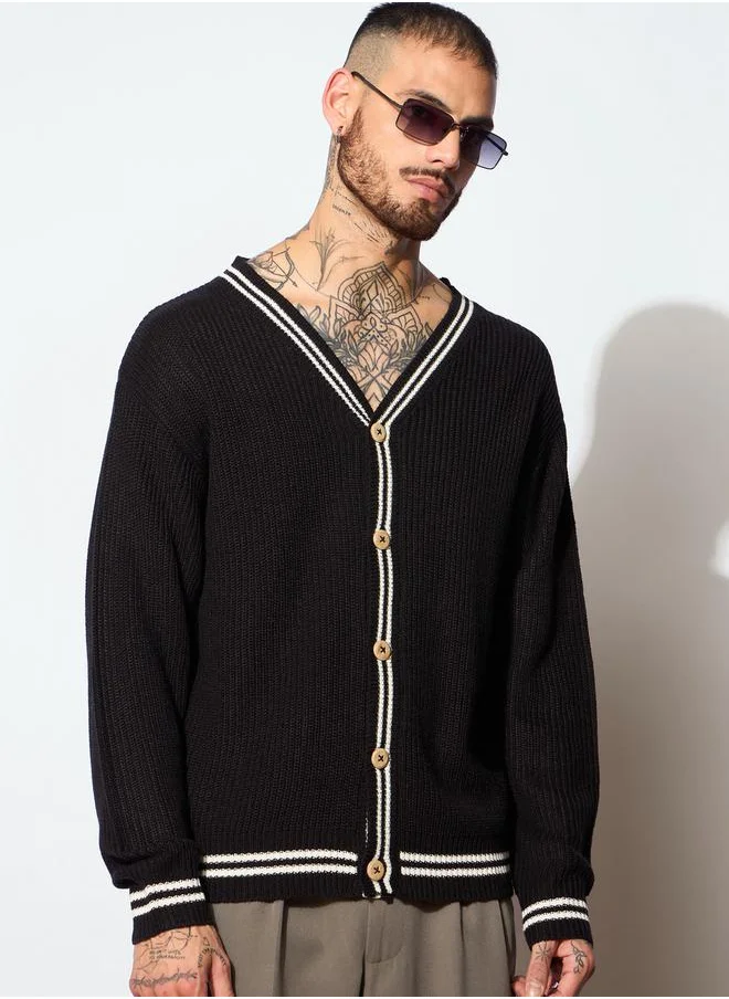 ماسكلن ساسافراس Unisex Black and Off White Front Button Cardigan by Styli
