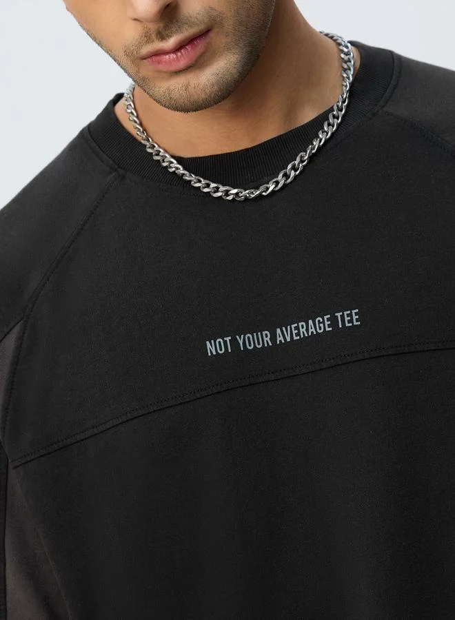 ذا سوليد ستور تيشيرت بأكمام راجلان وقصة واسعة