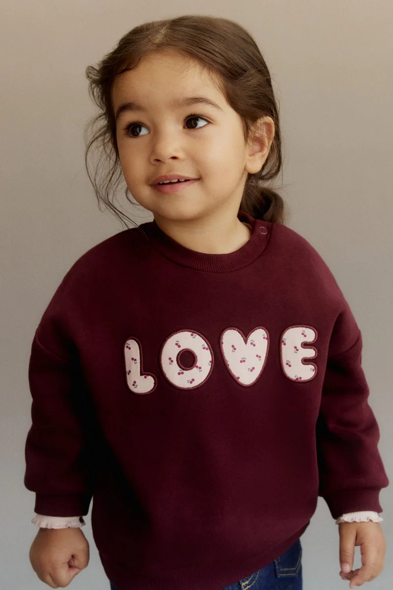 اتش اند ام سويت شيرت مزين بزخارف