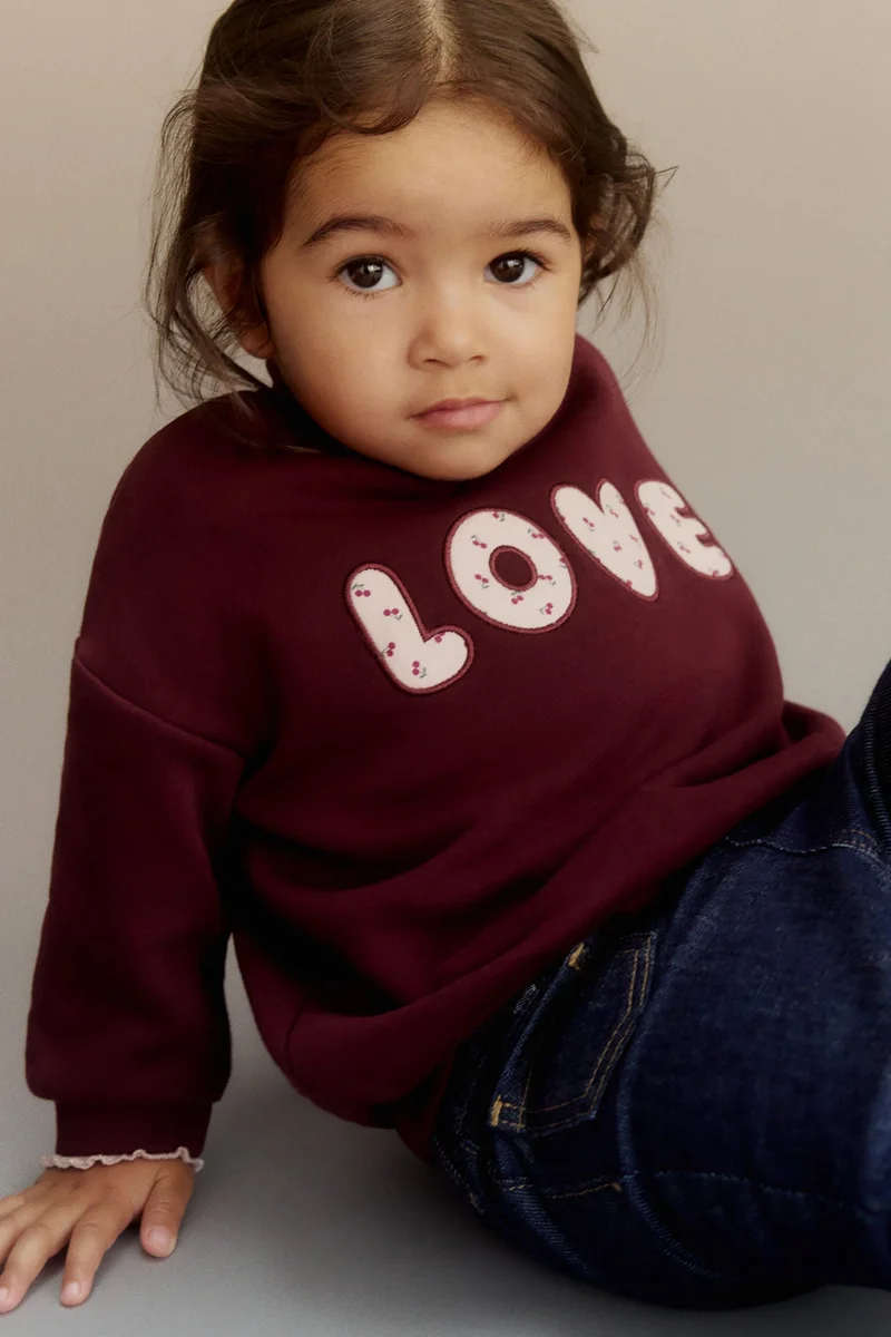 اتش اند ام سويت شيرت مزين بزخارف