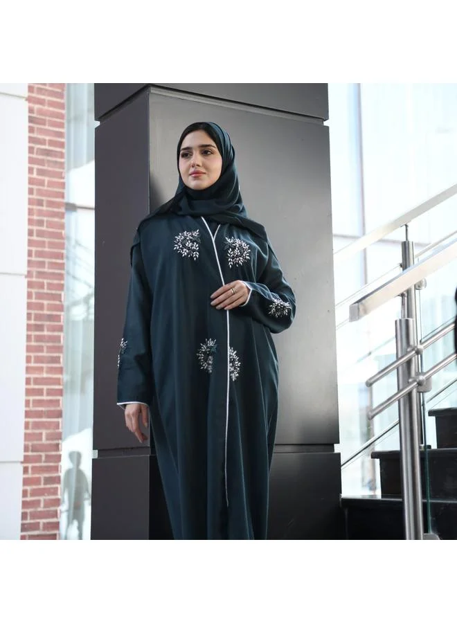 HAWRAA ABAYA Dark green wrap abaya decorated with prominent embroidery and strings on the edges of the abaya and sleeves