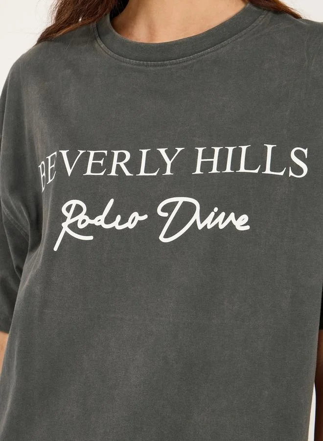 Styli Slogan Print Round Neck Oversized T-Shirt