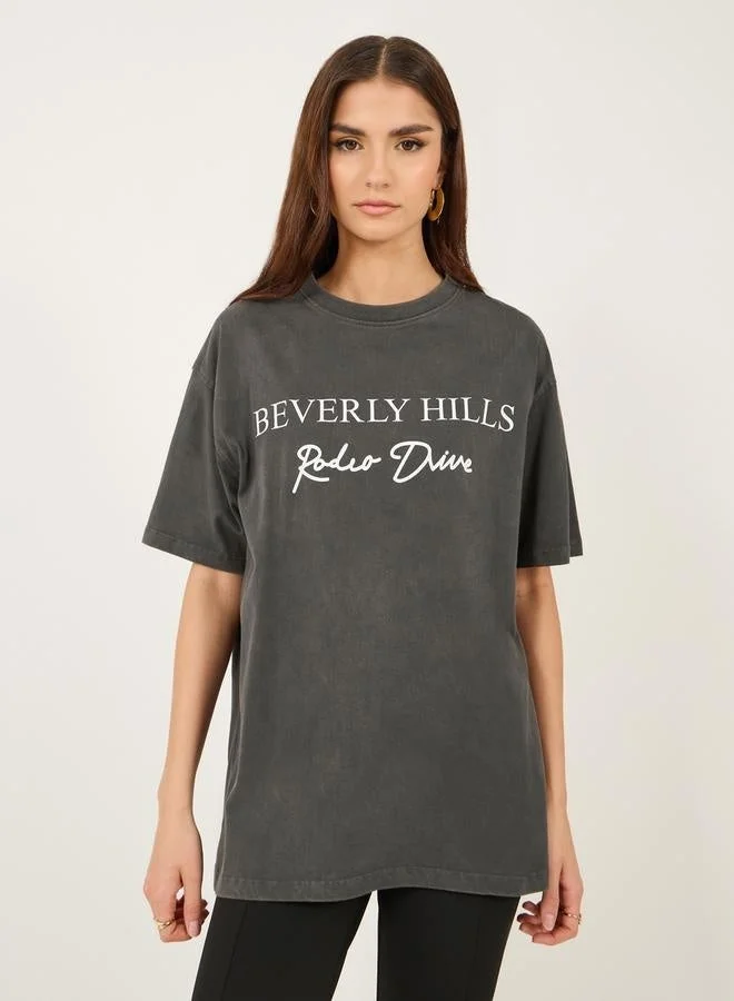 Styli Slogan Print Round Neck Oversized T-Shirt