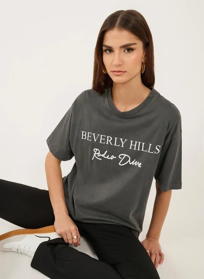 Styli Slogan Print Round Neck Oversized T-Shirt
