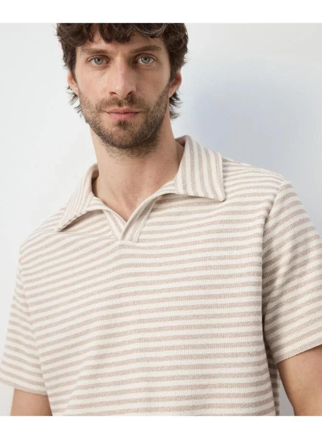 Mango Man  Regular fit textured stripe polo for Men | Best Price UAE