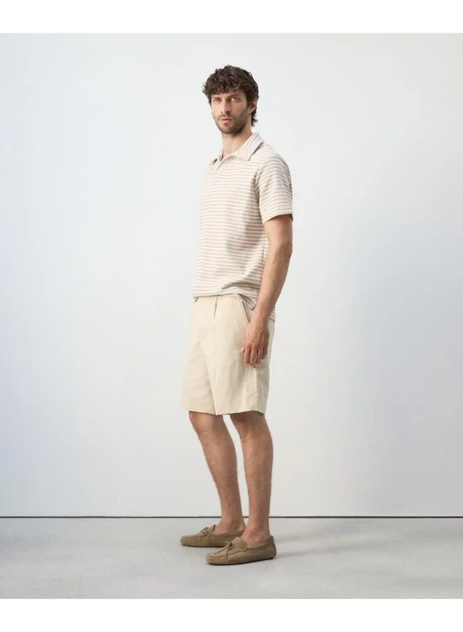 Mango Man  Regular fit textured stripe polo for Men | Best Price UAE