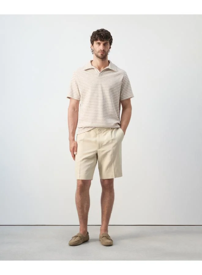 Mango Man  Regular fit textured stripe polo for Men | Best Price UAE
