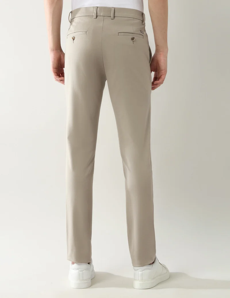 Arrow Khaki Slim Fit Knitted Autoflex Trousers for Men | Best Price UAE