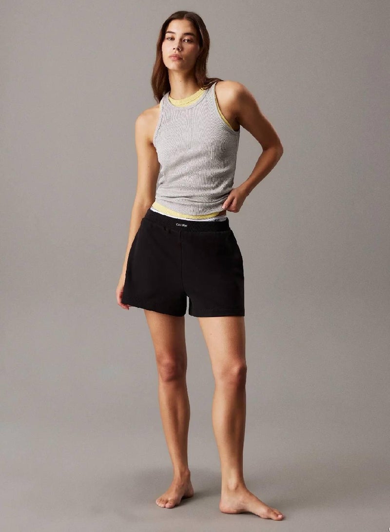 كالفن كلاين بلوزة مريحة بدون أكمام بنمط مضلع وبقصة سليم - Image 4