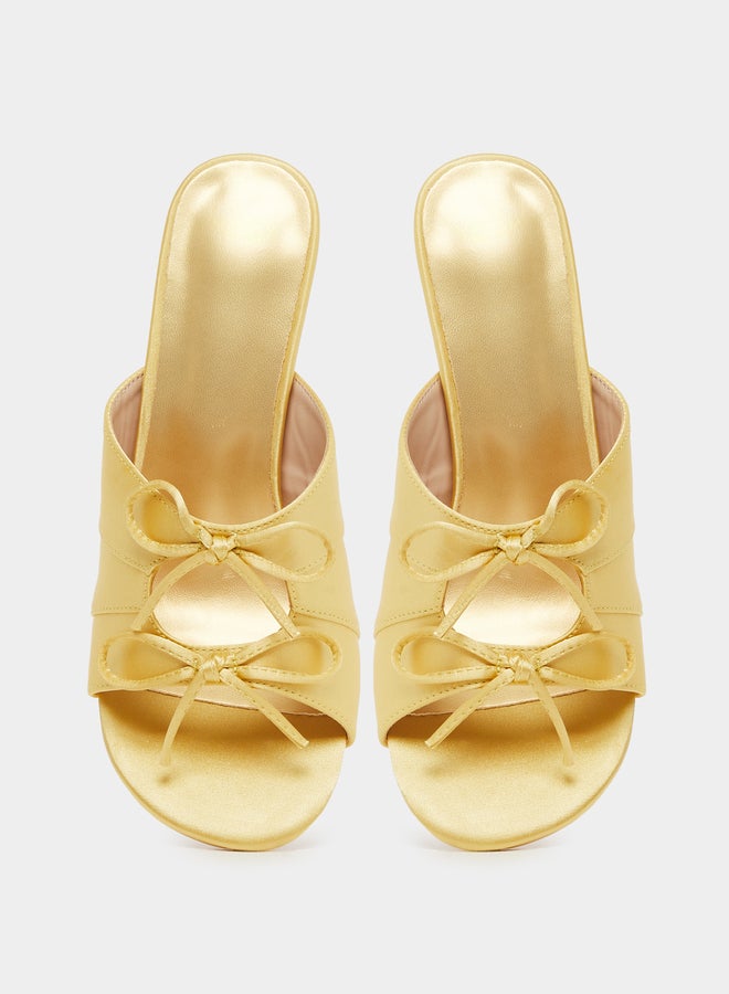 ستايلي صنادل بكعب ستيليتو بفتحات وزينة فيونكة - Image 5