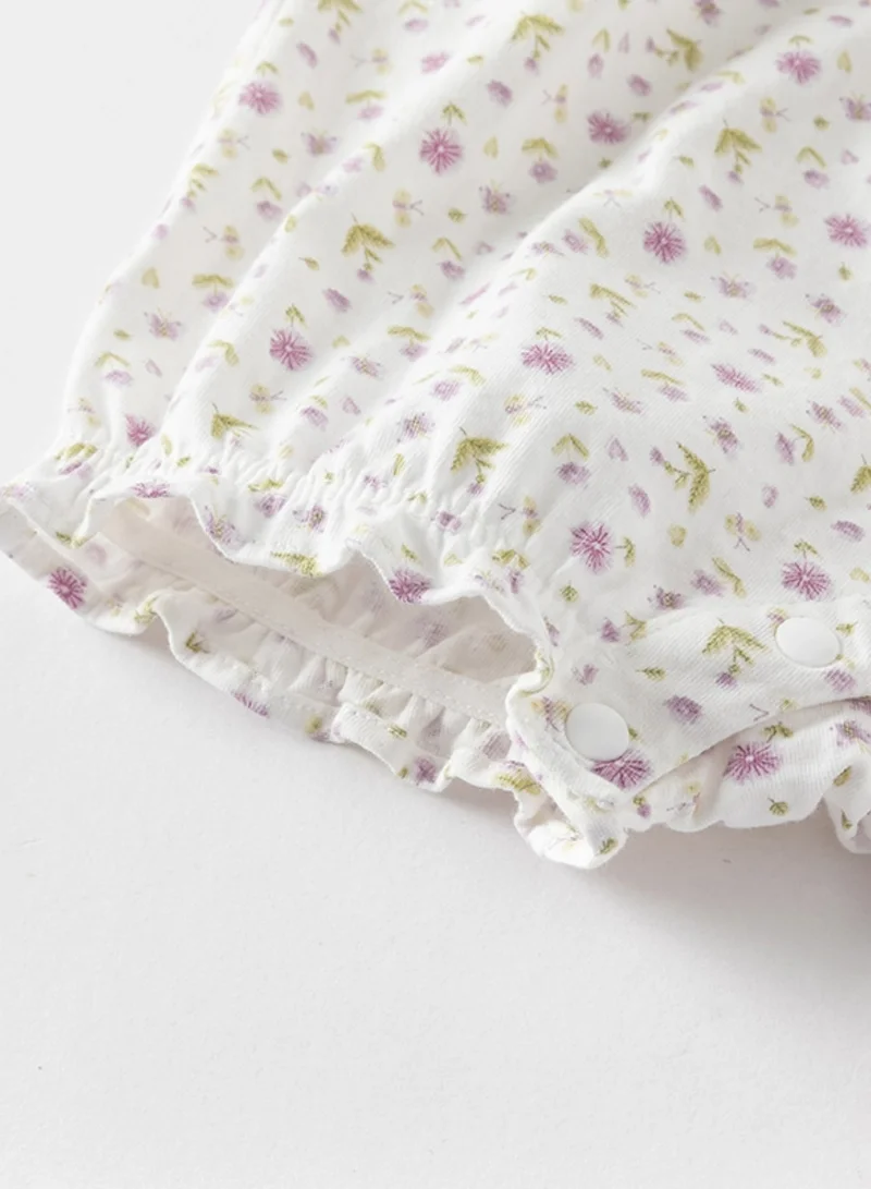 Dave & Bella Baby girl Cotton romper with lavender floral print and ruffle detail