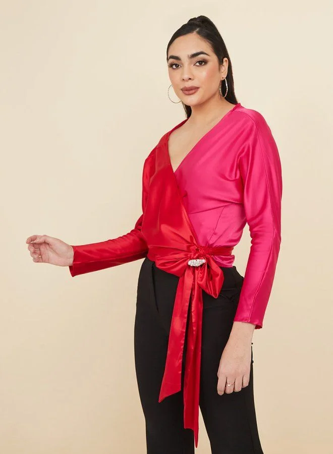 ستايلي Colorblock Satin Wrap Top with with Brooch Detail