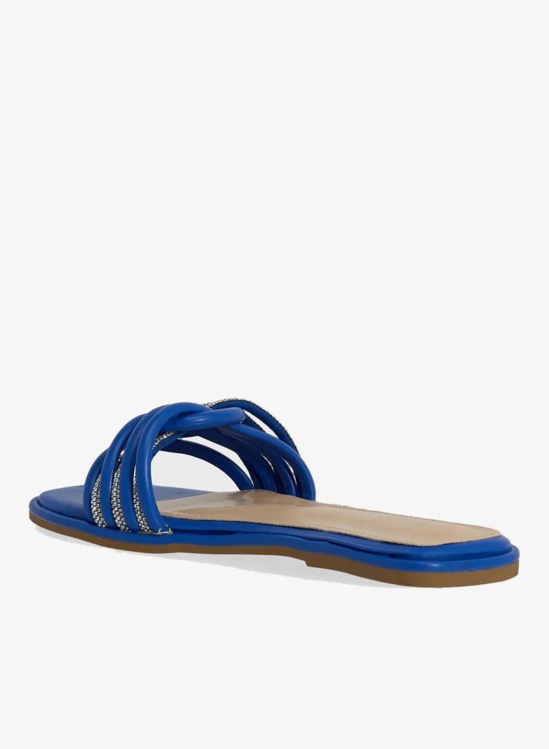 ايلا صندل مسطح بحزام منسوج