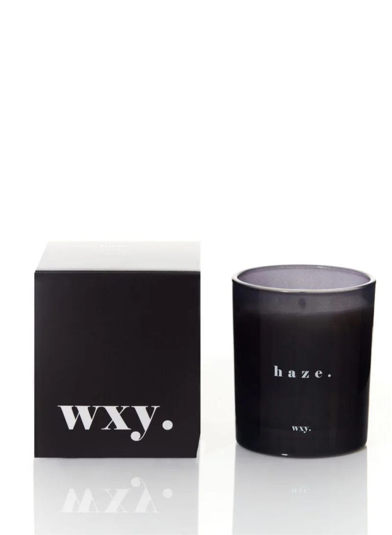 دبليو اكس واي شمعة معطرة  برائحة  الباتشولي