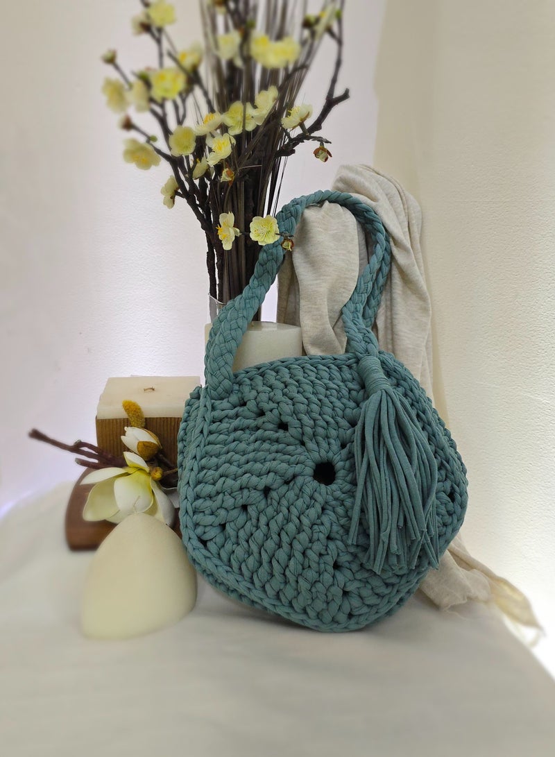 RandSac Dusty Teal Round Crochet Bag with Braided Straps and Tassel - Image 3