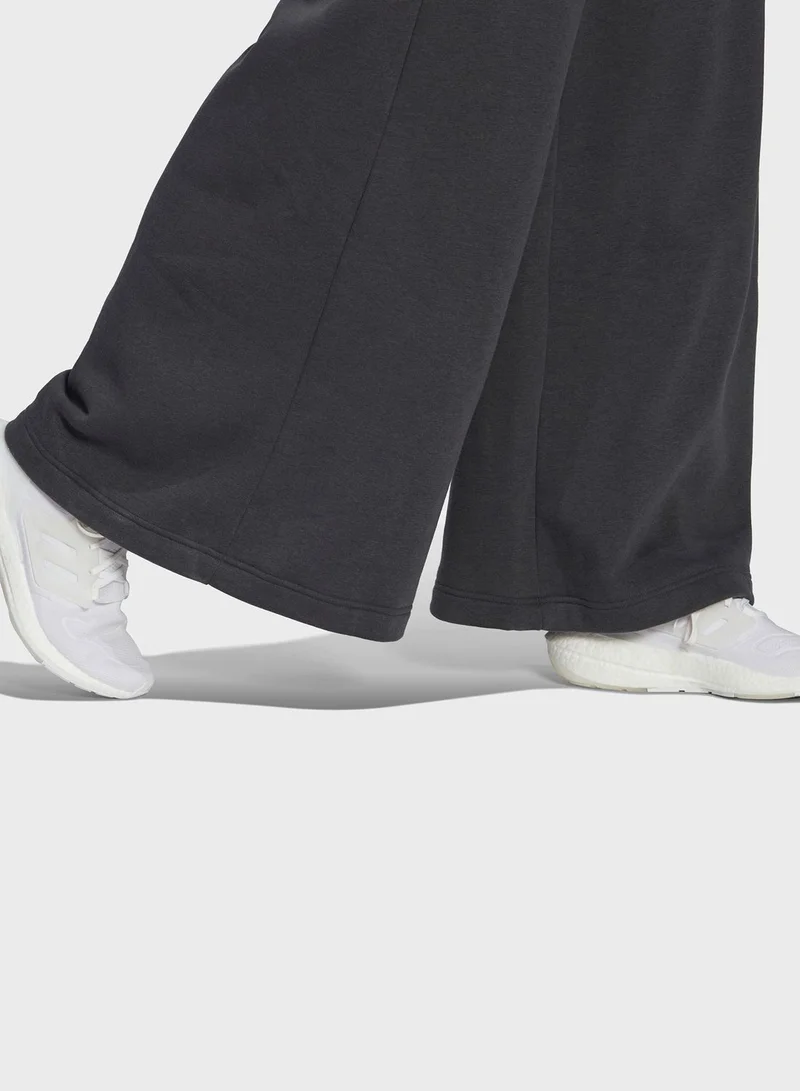 adidas بنطال رياضي بقصة ارجل واسعة