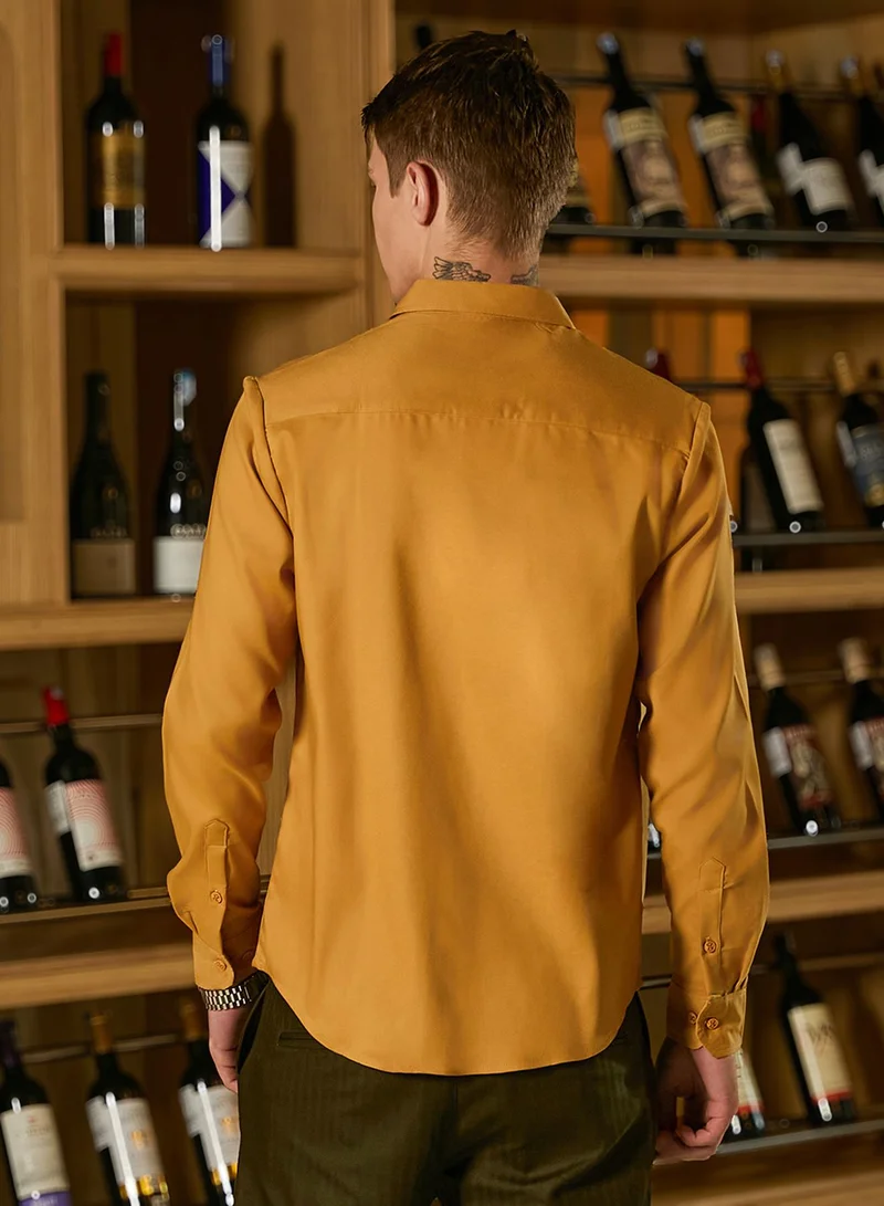 Campus Sutra Men's Mustard Yellow Solid Lustre Shirt