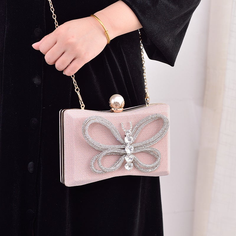 Elegant Black Bow Evening Clutch with Lock Clasp and Crossbody Strap - Image 5