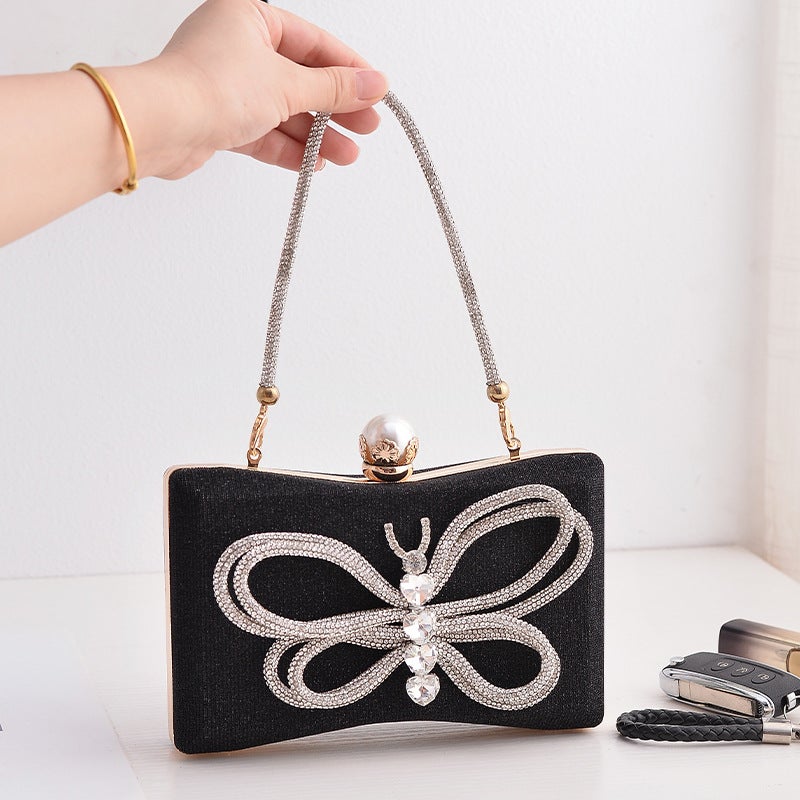 Elegant Black Bow Evening Clutch with Lock Clasp and Crossbody Strap - Image 2