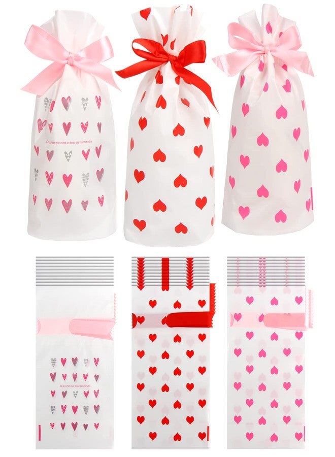 DIYASY Valentine's Day Small Drawstring Candy Gift Bags,36 Pcs Pink Red Heart Plastic Treat Bags for Wedding and Valentine Party Favors - Image 1