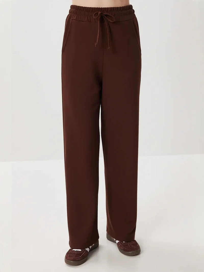 Lovely Istanbul ISTANBUL Asymmetrical Collar Long Sleeve Two-Piece Set with Wide Leg Pants