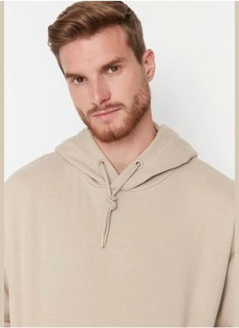 trendyol Beige Men's Oversize Basic Crew Neck Long Sleeved Hooded Sweatshirt with Soft Pillows.