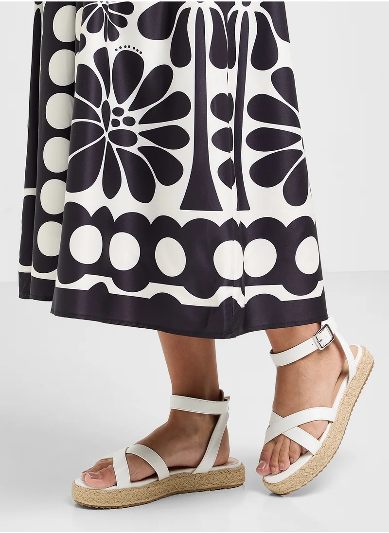 ترافل من نمشي Flatform Crossover Strap Wedge Sandal