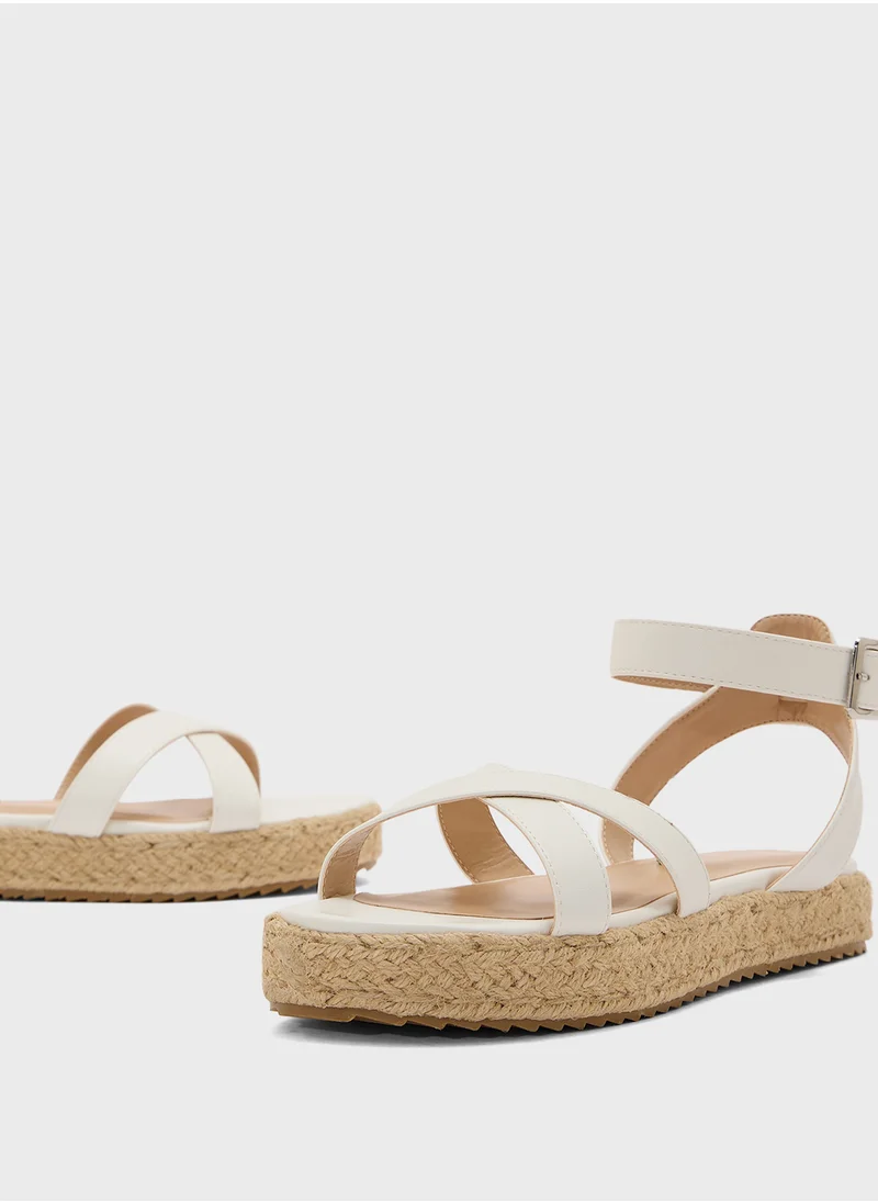 ترافل من نمشي Flatform Crossover Strap Wedge Sandal