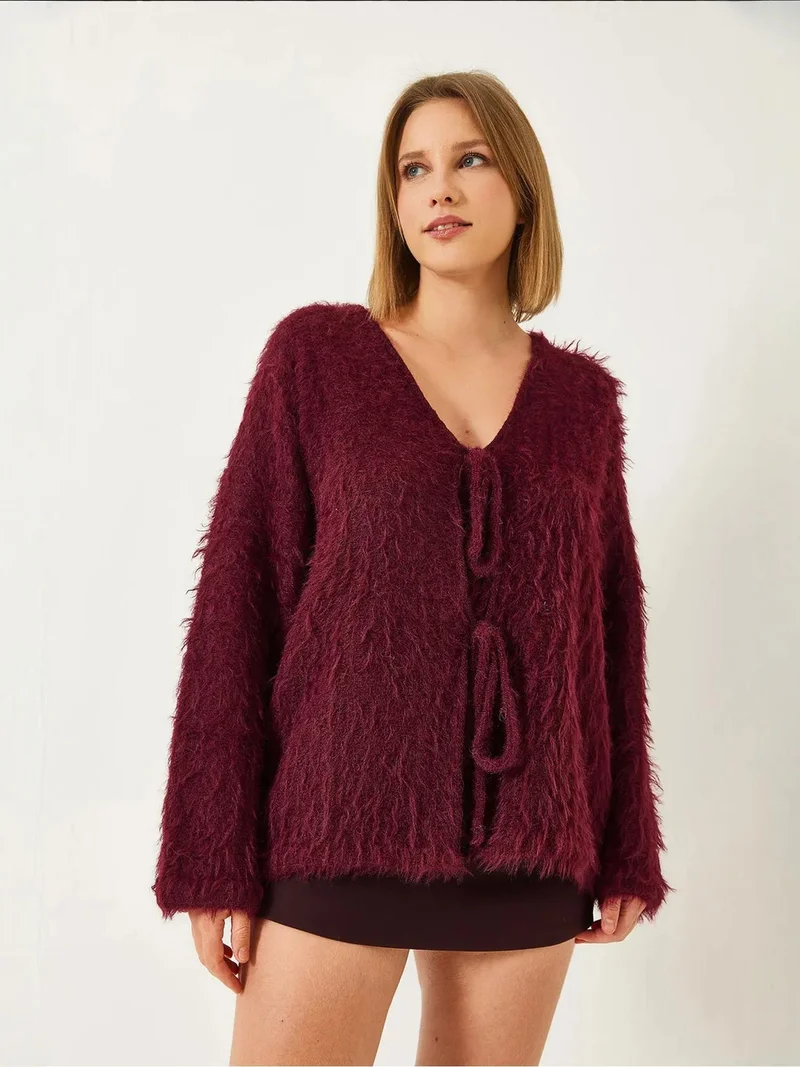 بيانكو لوتشي كارديجان طويل محبوك بنقوش بارزة وياقة على شكل حرف  مع كرات زينة