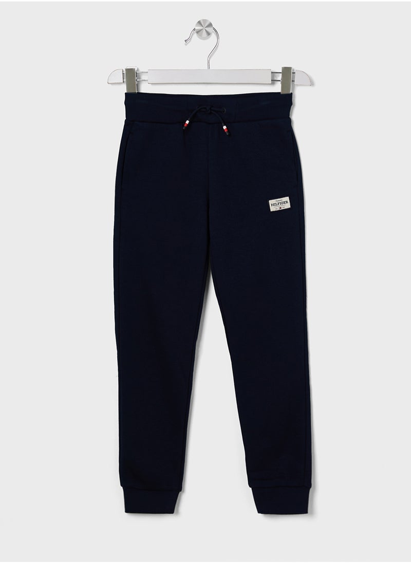 TOMMY HILFIGER Youth Monotype 1985 Label Logo Sweatpants  - Image 1