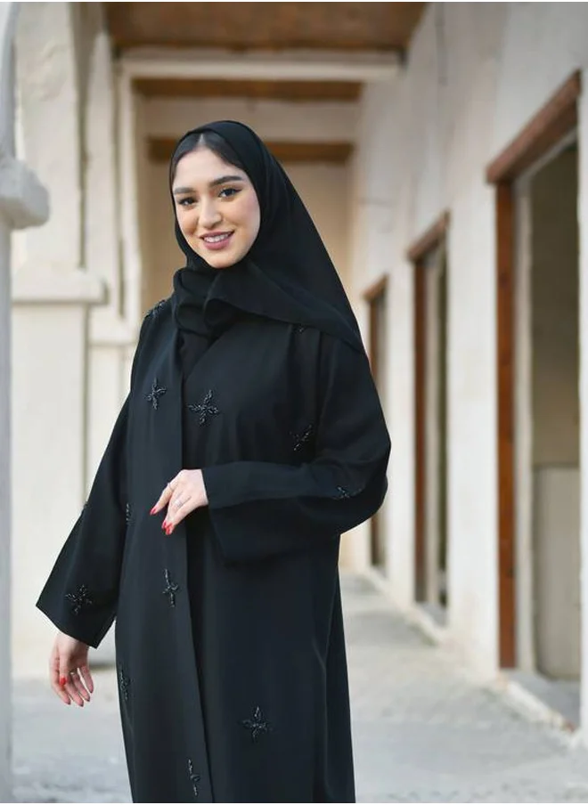 HAWRAA ABAYA Black wrap abaya with star embroidery