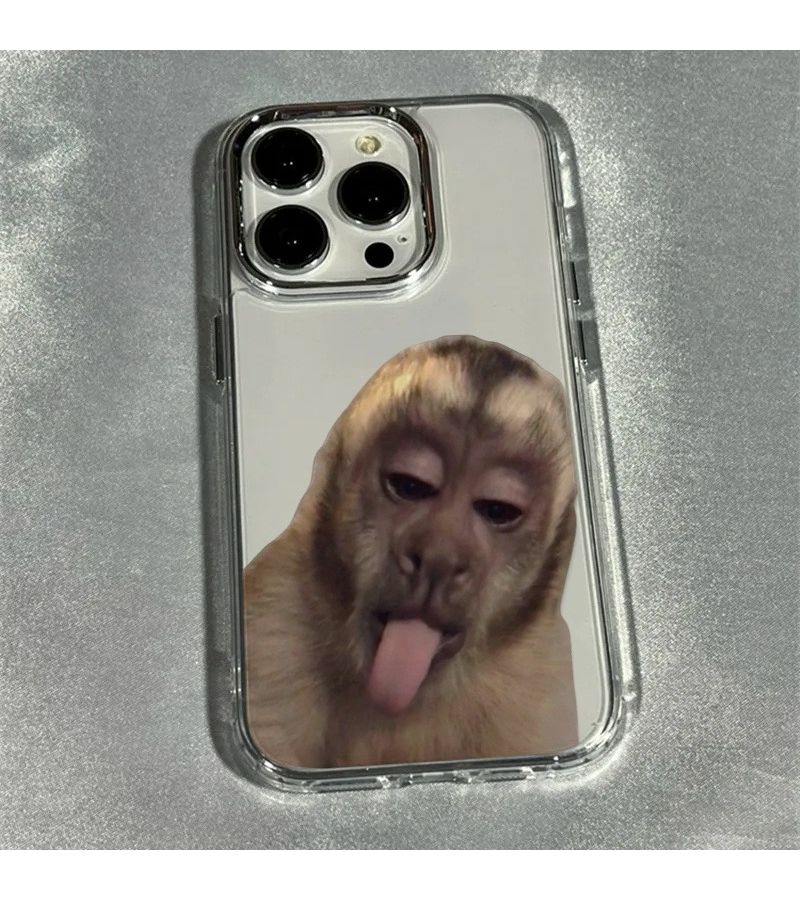 غطاء هاتف شفاف على شكل قرد يخرج لسانه بإطار معدني لجهاز iPhone 14 Pro - Image 1