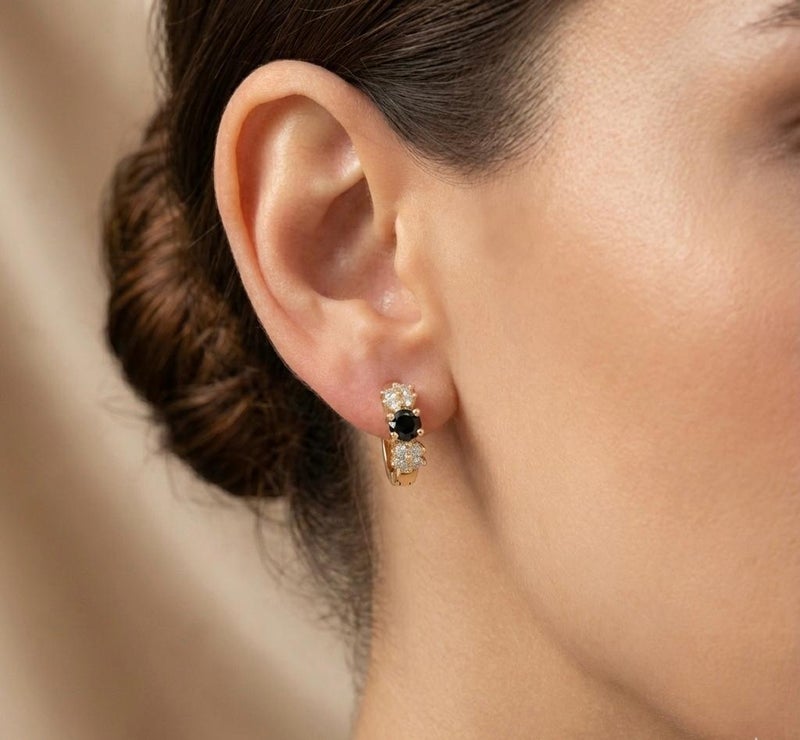 Eye-catching gold earrings, adorned with a round, regal black stone surrounded by sparkling zircon flowers. A perfect blend of luxury and elegance for a captivating everyday look. - Image 2