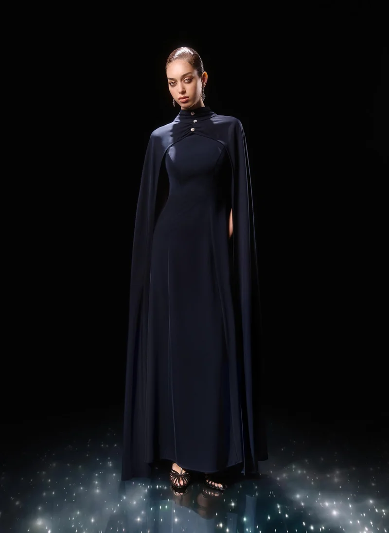 Fitted maxi dress with floor-length cape