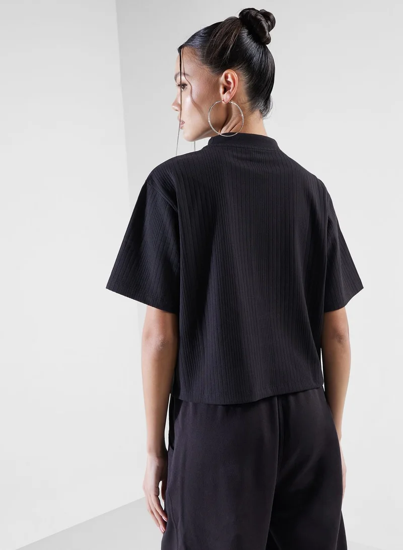 PUMA Classics Ribbed Relaxed Mock Neck T-Shirt