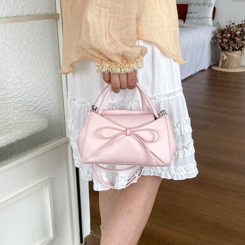 حقيبة توت نسائية من البولي يوريثان بتصميم فيونكة - Image 2
