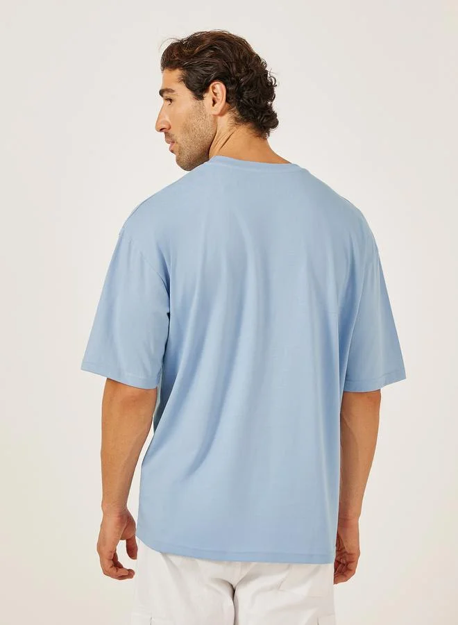 Styli Panda Graphic Print Pocket Detail Oversized T-Shirt