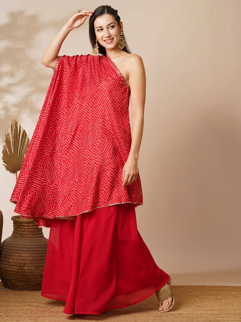 جلو باص Women Red Bandhani Printed One Shoulder Tunic & Georgette Skirt