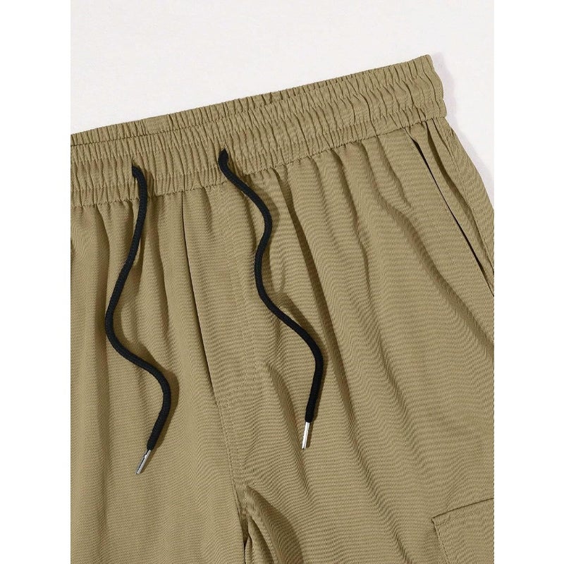 Men's cotton cargo pant with drawstring waist for outdoor use, khaki color, durable and functional design with multiple pockets - Image 5