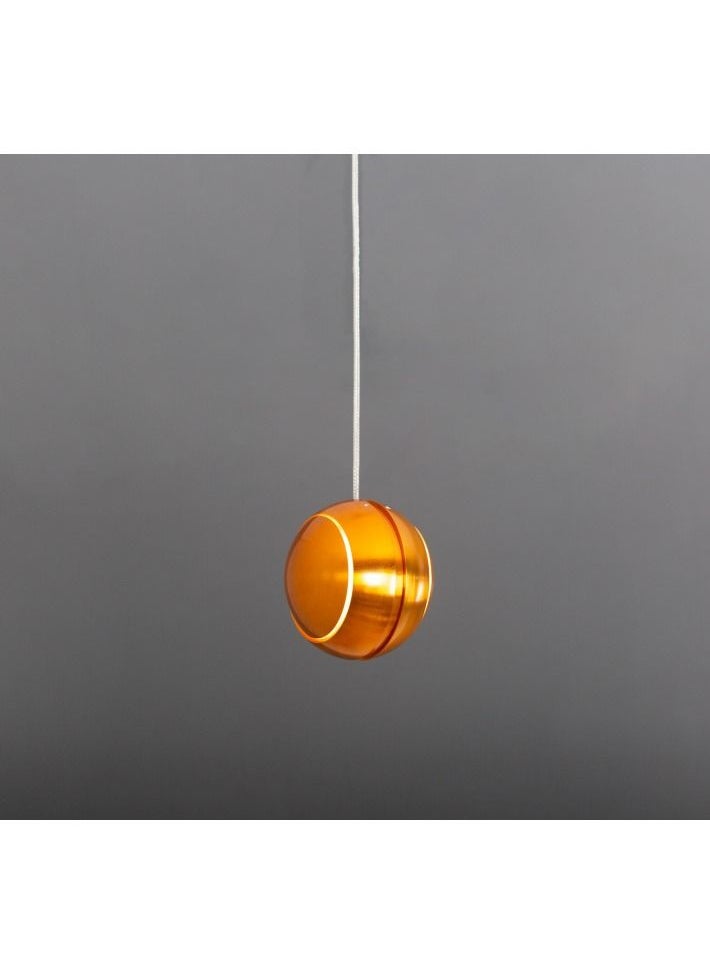 A golden chandelier hanging from the ceiling with a yocandel pendant