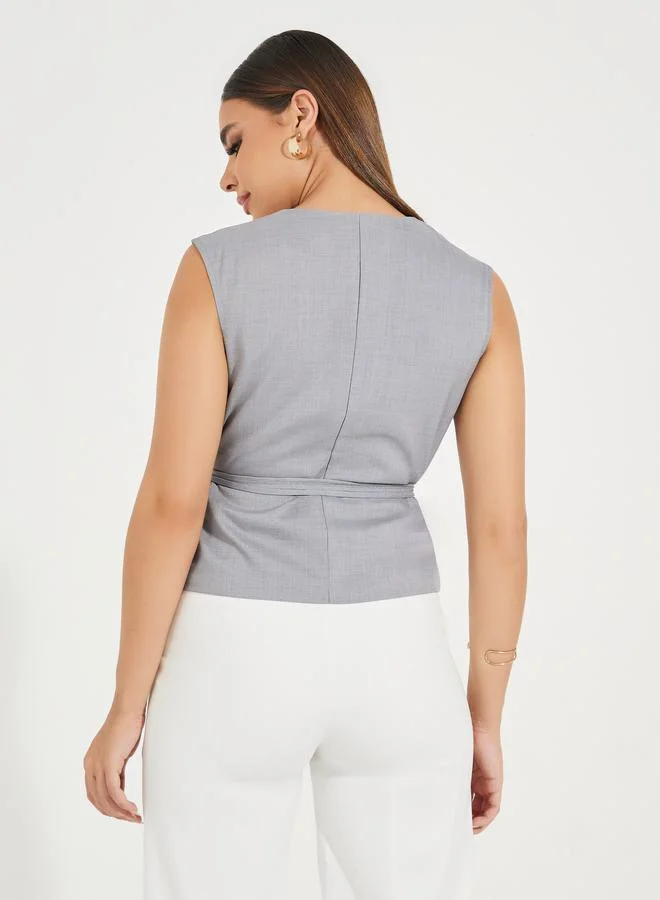 Styli Solid Sleeveless Wrap Top with Waist Tie Detail