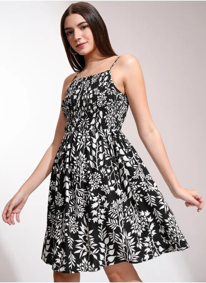 Tokyo Talkies All-Over Floral Print Strappy Mini Dress with Smocked Detail by Styli