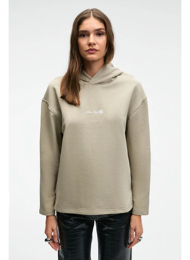GRIMELANGE CAMELLIA Women's Front Embroidered Skirt Hem Slit Hooded Comfort Fit Stone-Colored Sweatshirt.