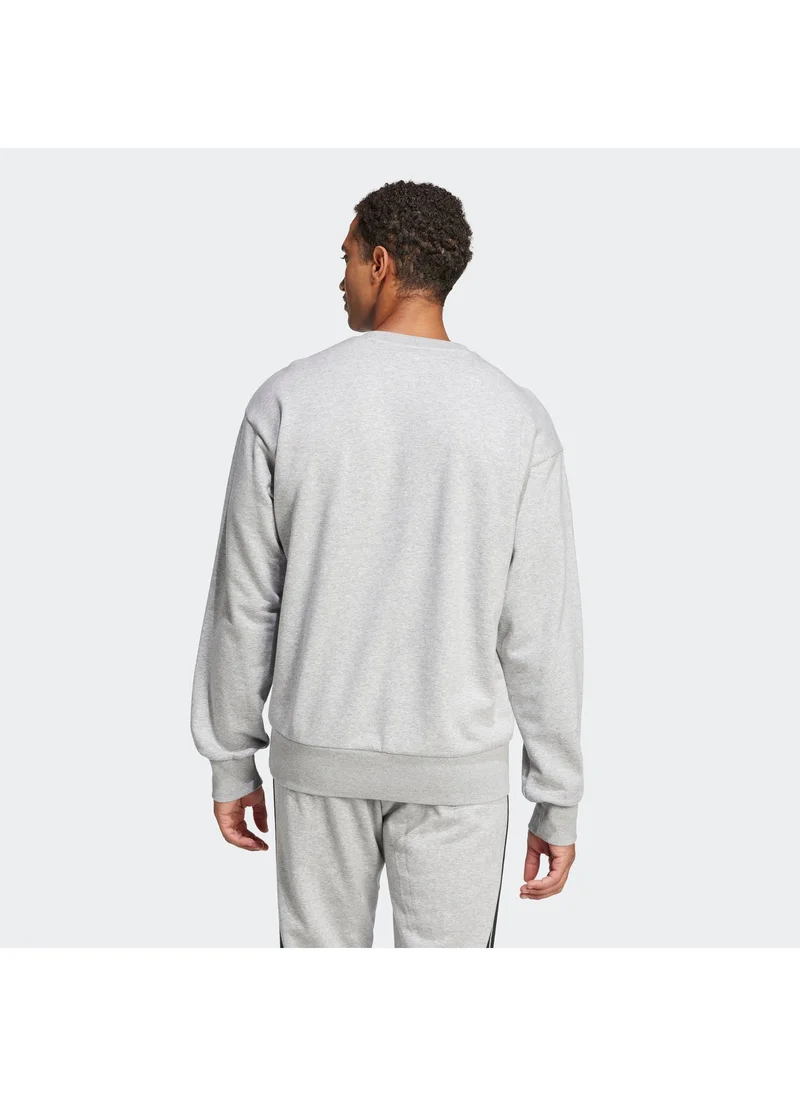 اديداس سويت شيرت رجالي أساسي بتصميم شعار كبير من نسيج التيري الفرنسي