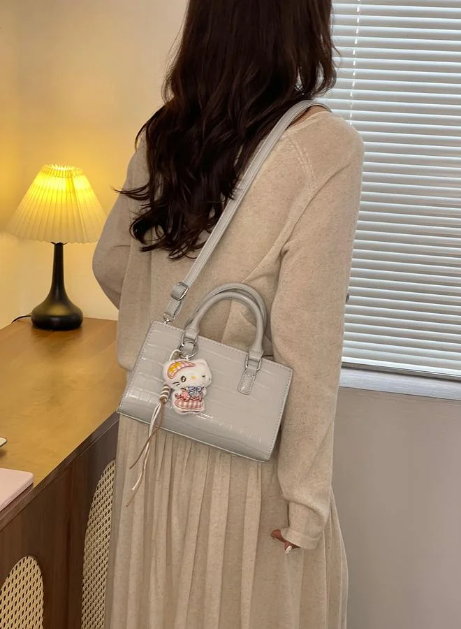 Take Two Textured Crossbody Bag With Plush Charm