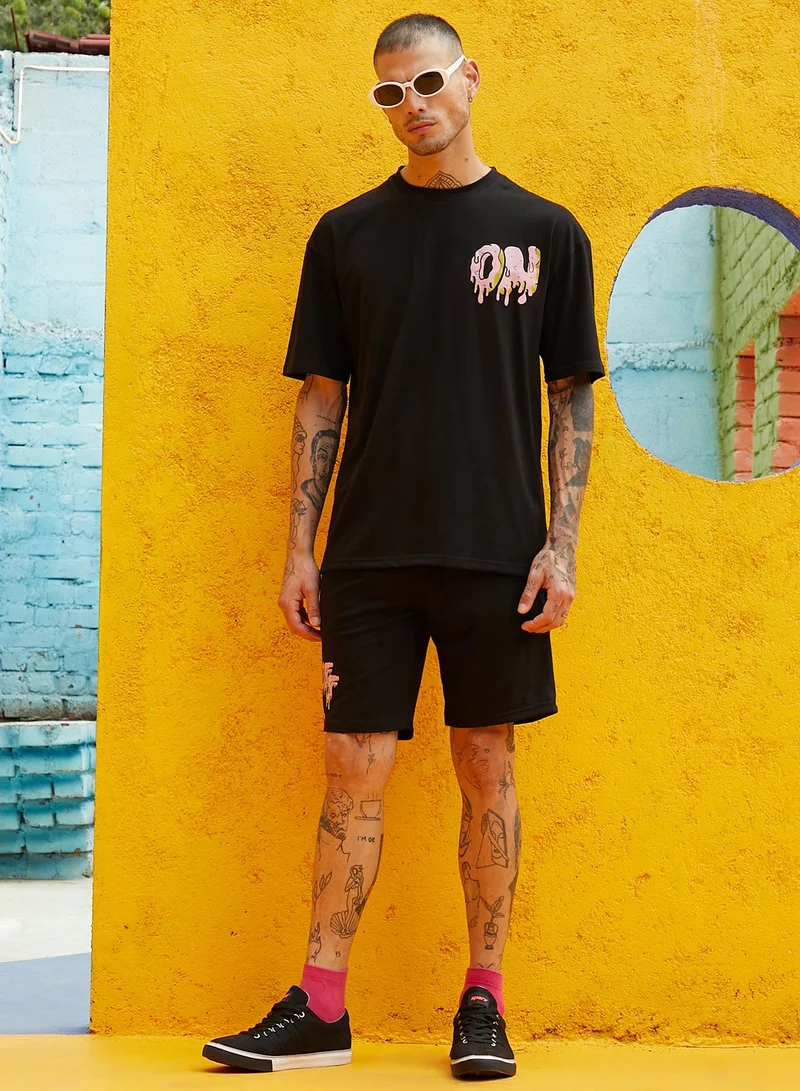 Campus Sutra Men's Black Relaxed Co-Ord Set With Graphic Print