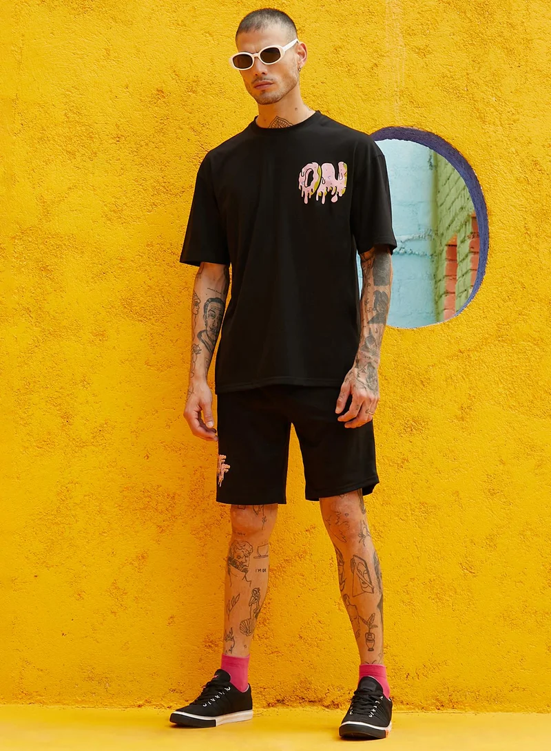 Campus Sutra Men's Black Relaxed Co-Ord Set With Graphic Print