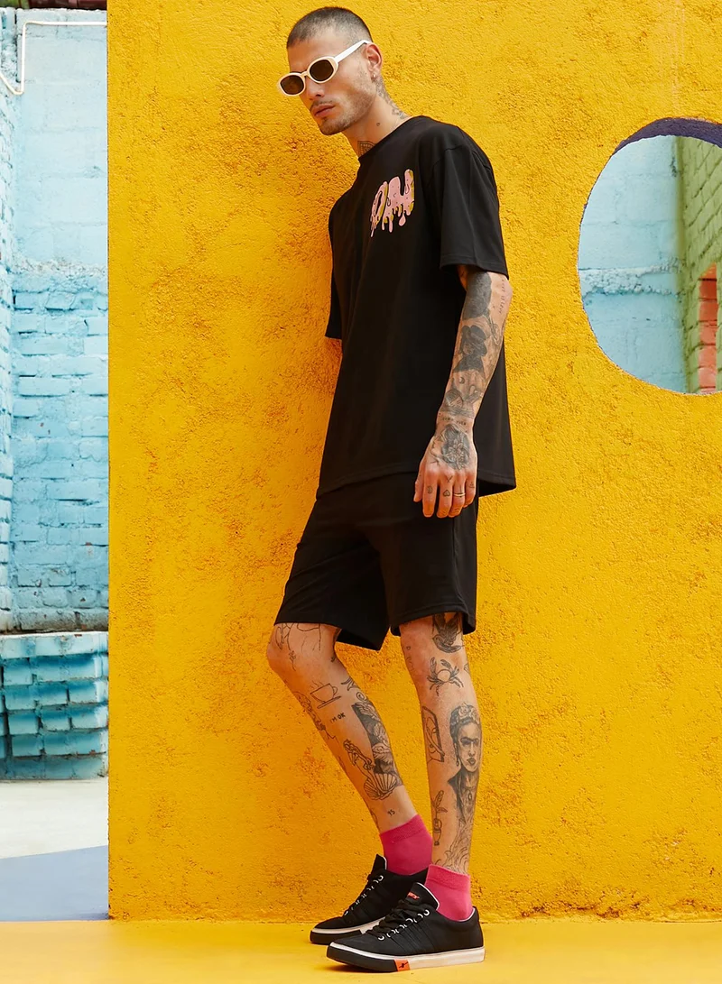 Campus Sutra Men's Black Relaxed Co-Ord Set With Graphic Print